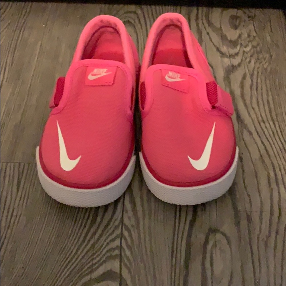 Pink Nike slides